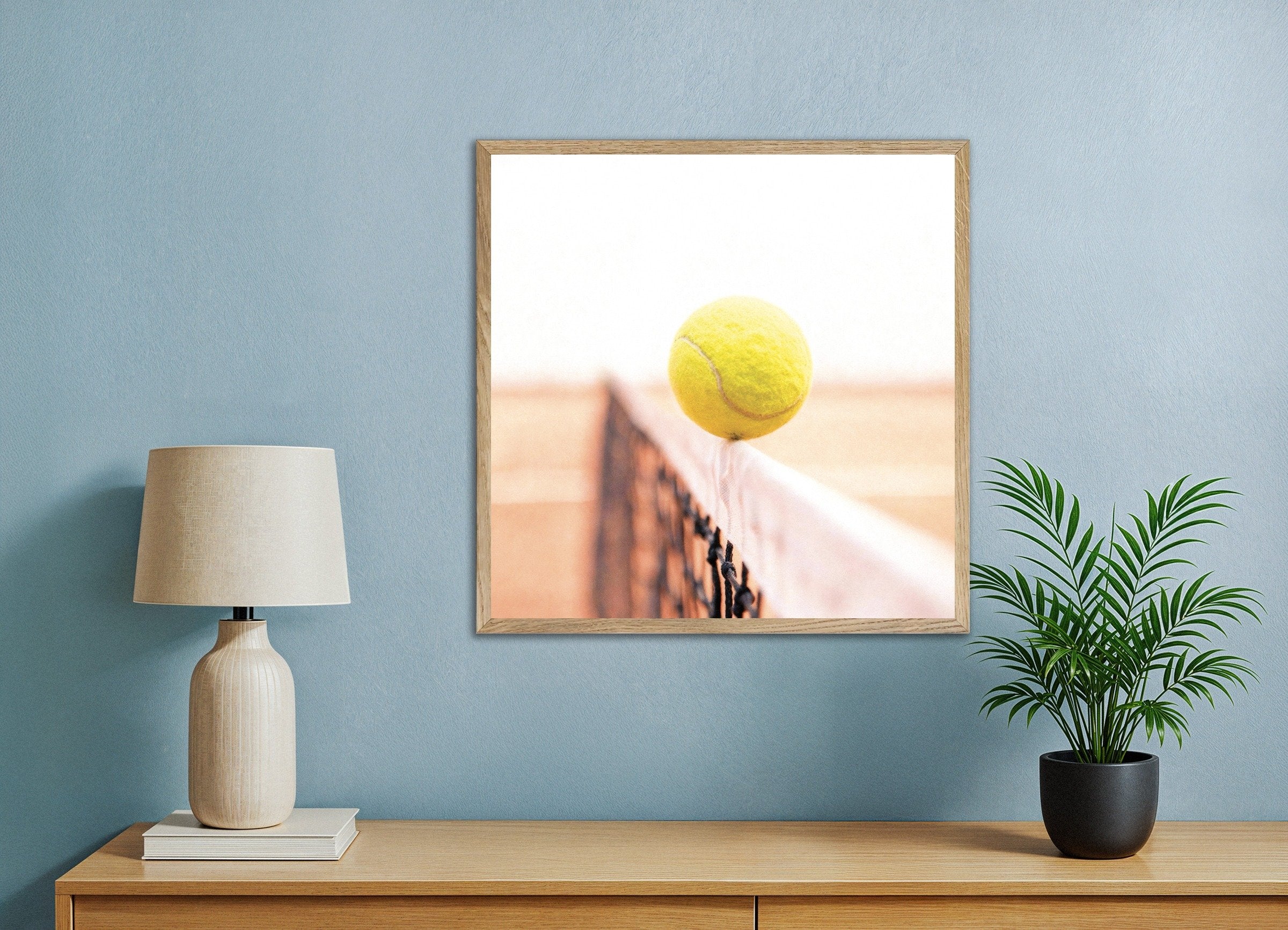 Poster of Tennis ball on net poster – minimal sports photography print, with natural wooden frame